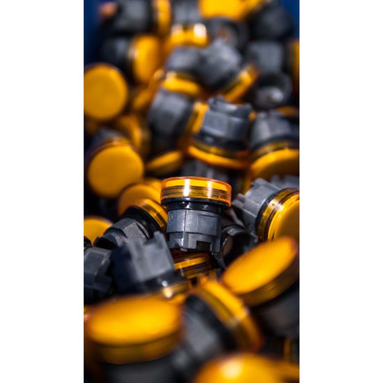 Picture of Push button head, Harmony XB5, plastic, flush, green, 22mm, spring return, coloured boot, unmarked